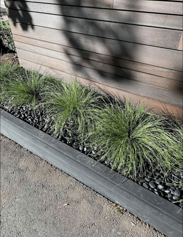 Are River Rocks a Good Choice for Flower Beds?