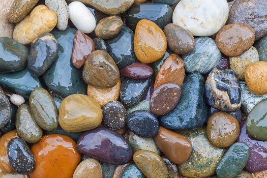 Colared rocks in the river  River rock, River rock landscaping, Rock and  pebbles