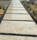 Black pebbles on house floor