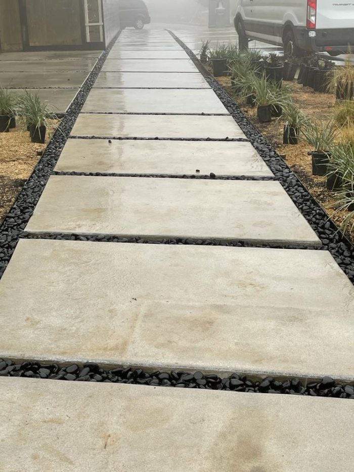 Black pebbles on house floor